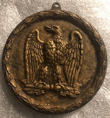 Mystery Colonial-themed medal obverse