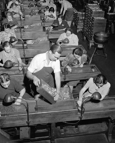 Female Philadelphia Mint employees inspect cents in 1941