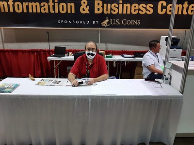 ANA 2021-08 Greg Ruby at info desk with mask3