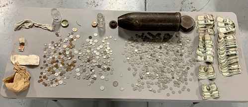 coins and notes found in amunition round