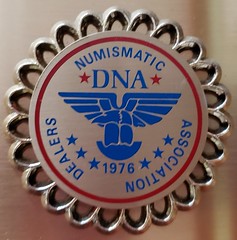 Dealer's Numismatic Association logo
