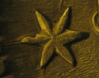 Broken Star found on some Capped Bust half dollars