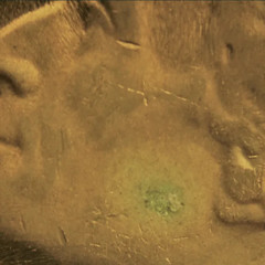 Developing corrosion spot on Jefferson nickel