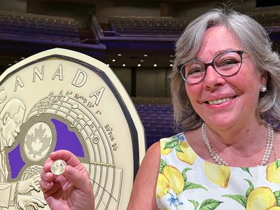 widow of Oscar Peterson with new coin