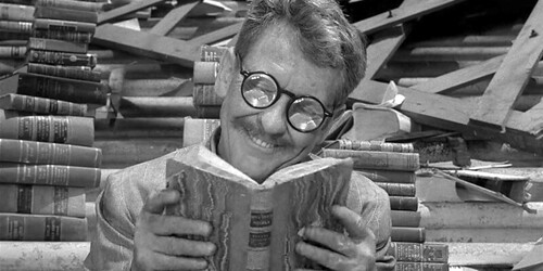 Henry-Bemis reading Twilight Zone
