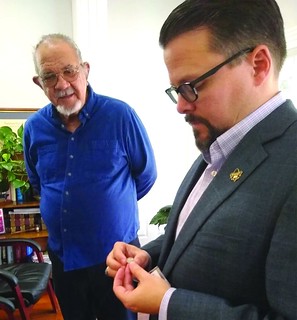 Man Pays Lawyer with Ancient coin
