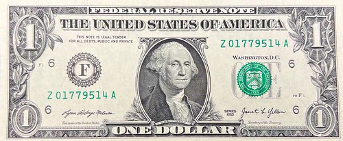 Yellen signature on dollar bill