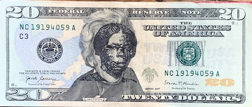Harriet Tubman overstamp on a $20 bill