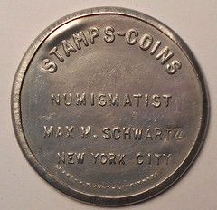 Max Schwartz encased postage stamp reverse