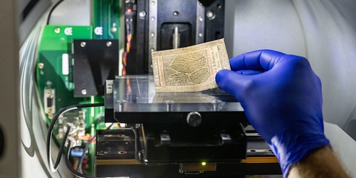 Researcher tests colonial paper money