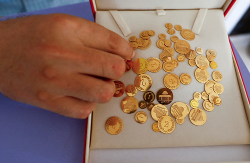 Gaza dentist's gold coin tokens