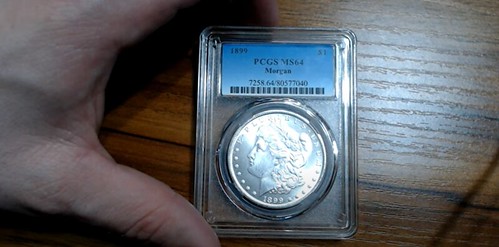 counterfeit coin in fake PCGS holder