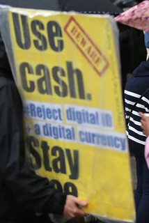 Use Cash protest sign