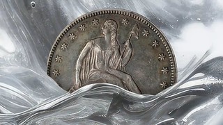 1877 Liberty Seated half dollar melting