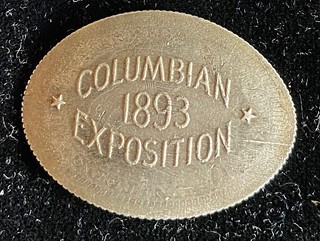 Columbian Exposition elongated 1860 Seated Quarter