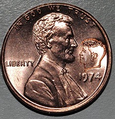 Kennedy facing Lincoln cent