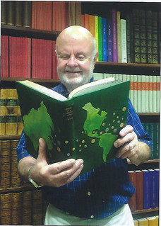 George Kolbe admiring book
