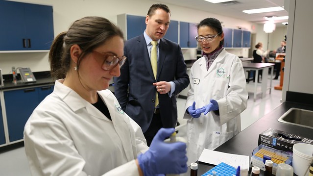 Chemists at TC Scientific describe their work to Minister Bilous