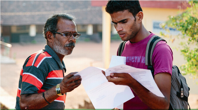 A paralegal examining documents of a complainant. Source: CPR-Namati
