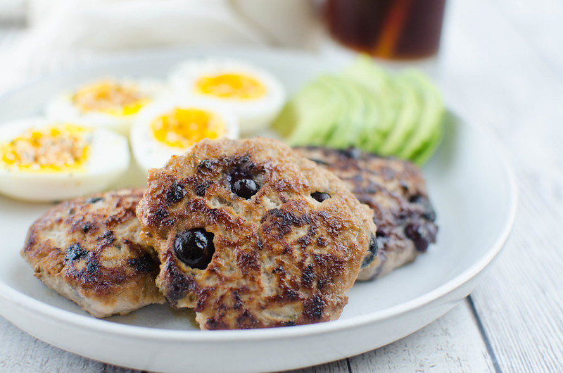 Paleo Maple Blueberry Turkey Breakfast Sausage - the perfect paleo breakfast! Lean ground turkey is mixed with spices, fresh blueberries, and maple syrup. You won't believe how easy homemade breakfast sausage is!