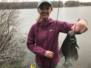 Girl holding a crappie