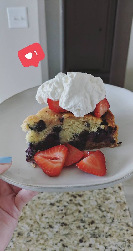Blueberry Coffee Cake with strawberries and whipped cream
