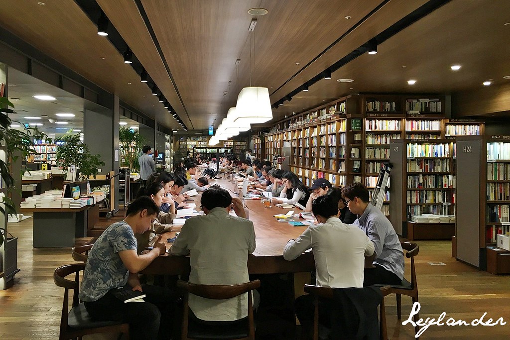 Patrons reading books inside Kyobo Book Center