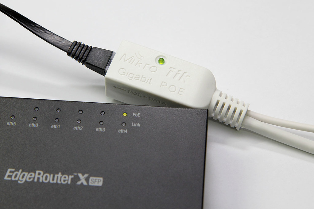 MikroTik PoE adapter, shown here being powered by an EdgeRouter X