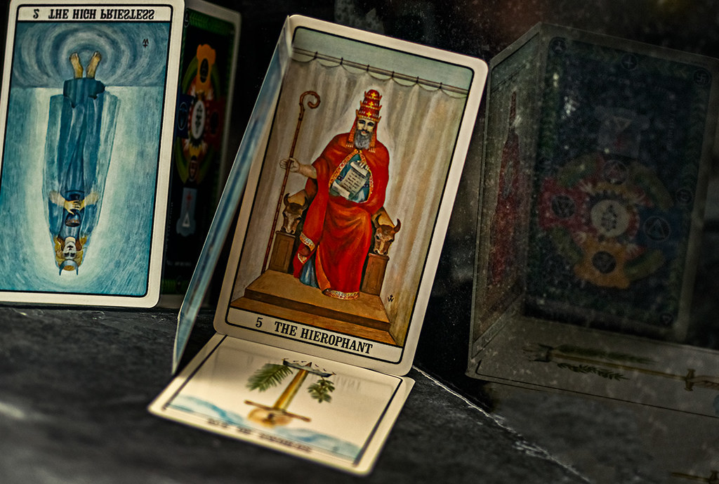 Tarot cards: The Hierophant, The High Priestess, the Ace of Swords