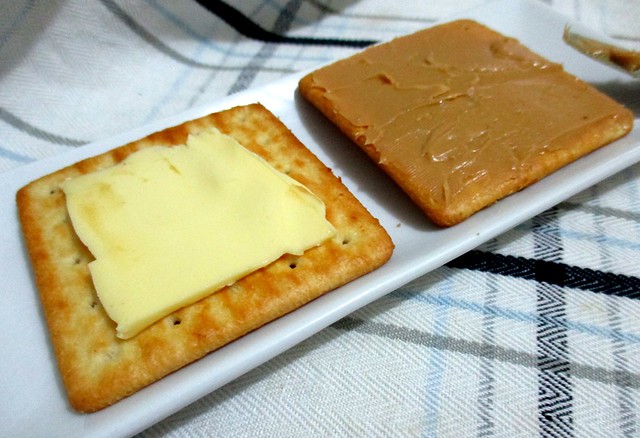Butter on one side, peanut butter on the other