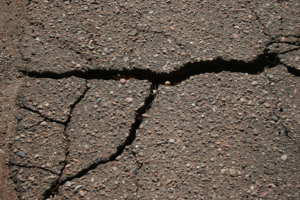 Image result for broken pavement