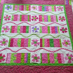 A beautiful quilt for project warmth is now quilted for my Aunt Jane.