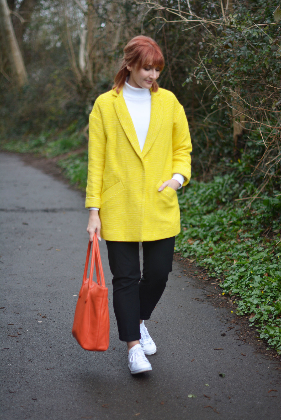 Yellow duster coat with black, orange and white Adidas Stan Smiths | Not Dressed As Lamb