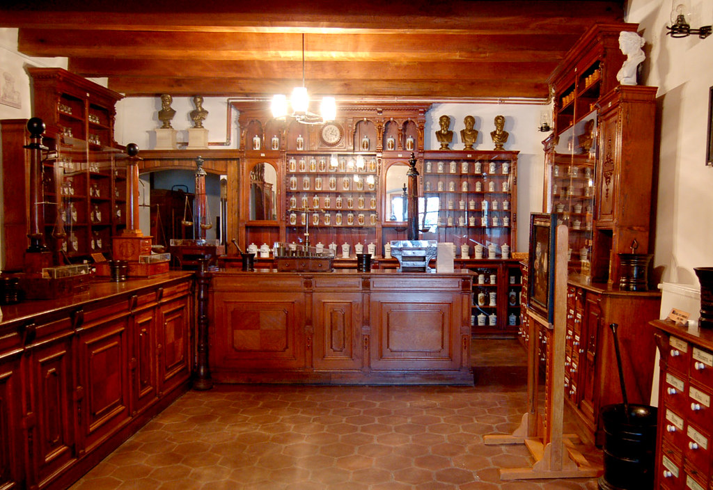 Old-fashioned pharmacy, all wood and glass  At the Muzeul 