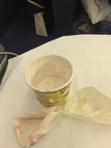 two plastic covers ,  ice cream cup