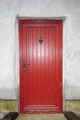 A bright red front door.