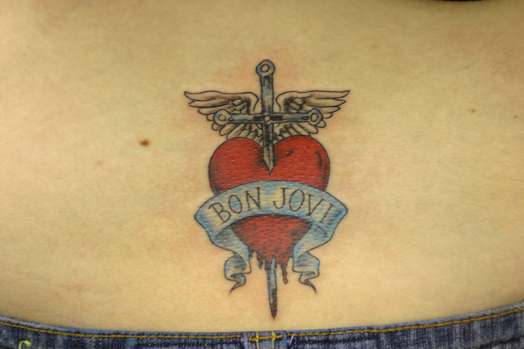 bon jovi heart, sword wings and scroll tattoo | Tattooed by … | Flickr