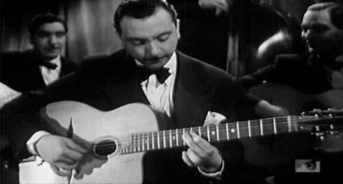 Django Reinhardt playing his Selmer Maccaferri Guitar | Flickr