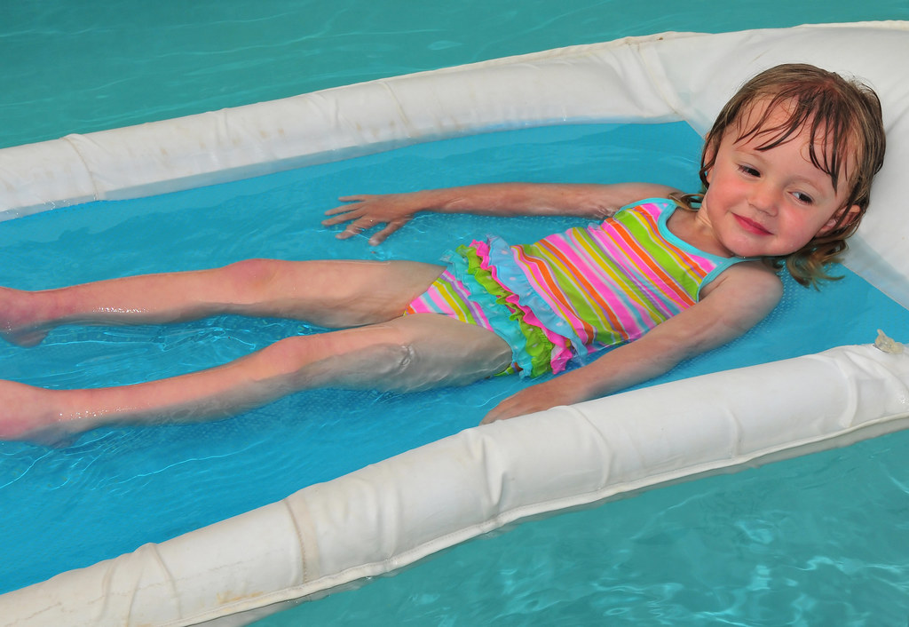 girl on pool float