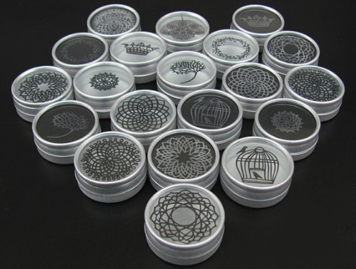 Paper cuttings on mini-containers by Parth Kothekar