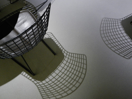 Artsy chairs cast artsy shadows in the Brussels Museum in Belgium