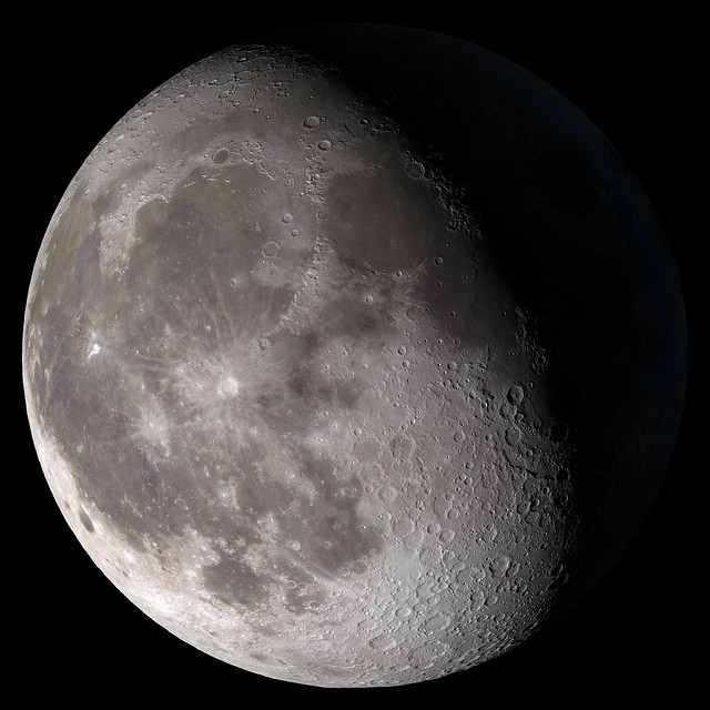 a Waning Gibbous moon is seen in the sky
