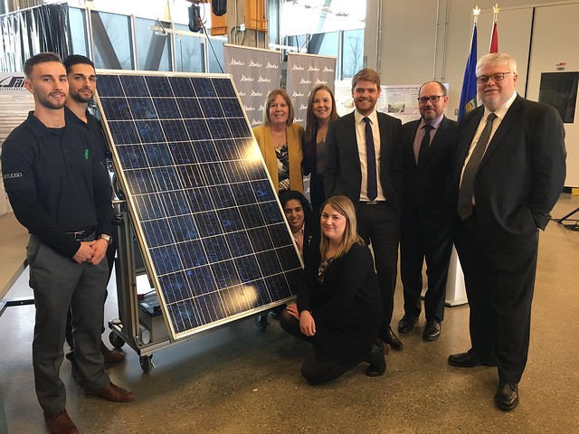 Energy Minister with Calgary MLAs, SAIT officials and graduates