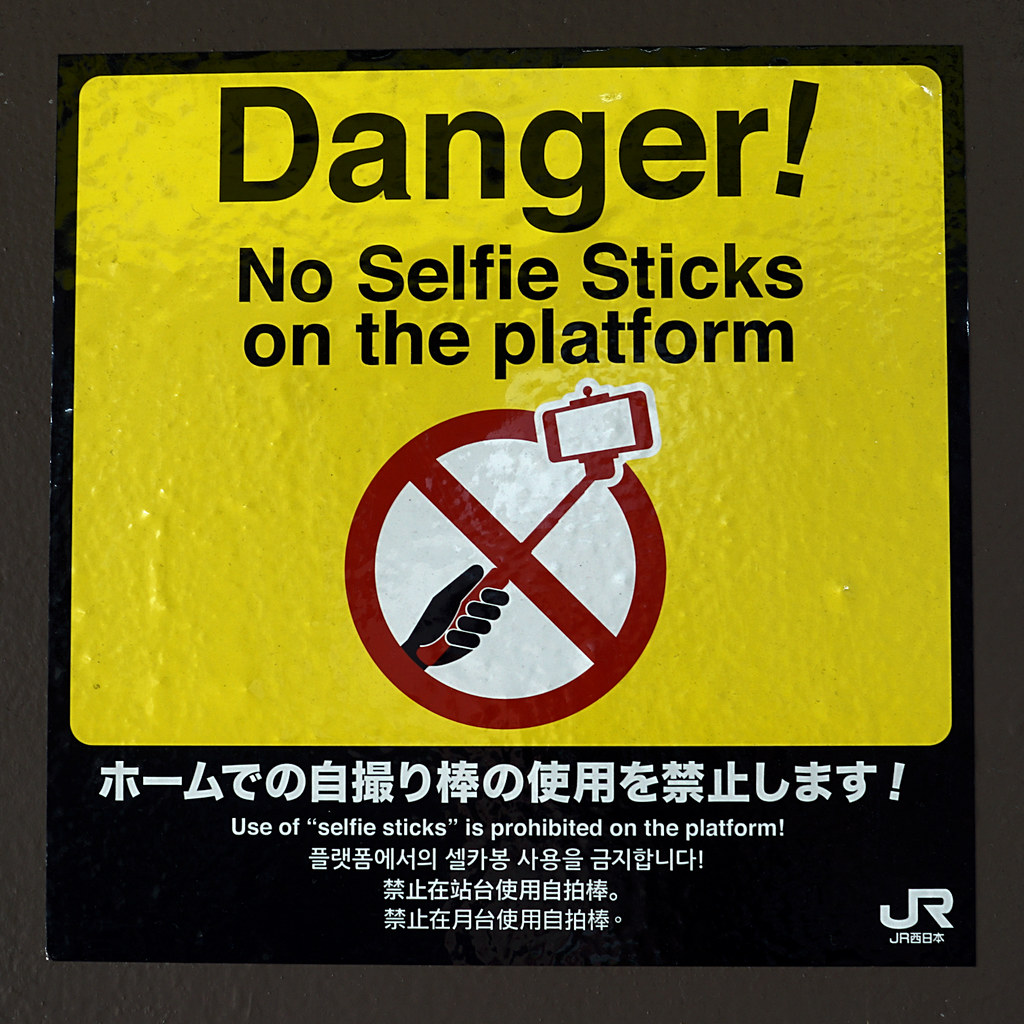 Danger! No Selfie Sticks on the platform sign at a Japan Rail station
