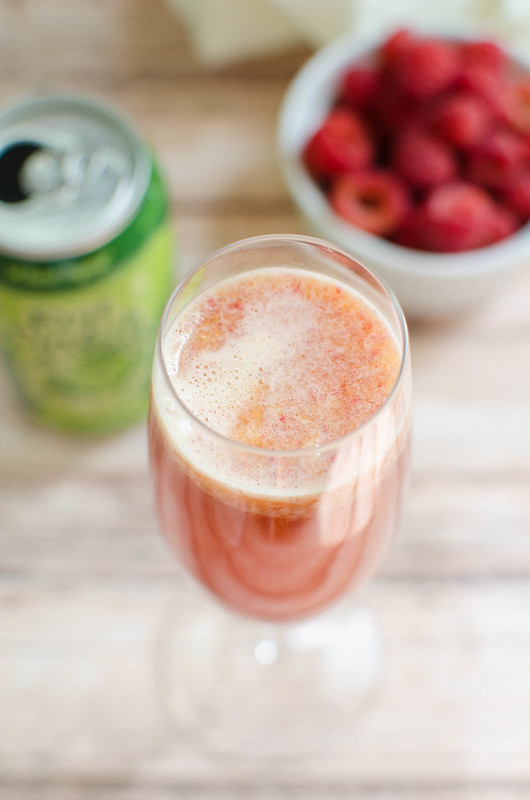 Raspberry Beermosas - the perfect brunch cocktail for beer lovers! Fresh raspberries, orange juice, and your fave beer make the most delicious beer cocktail!
