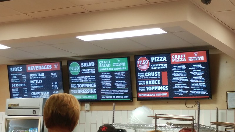 Menu board at Rapid Fired Pizza.