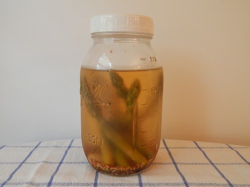 Not-full jar of asparagus pickles