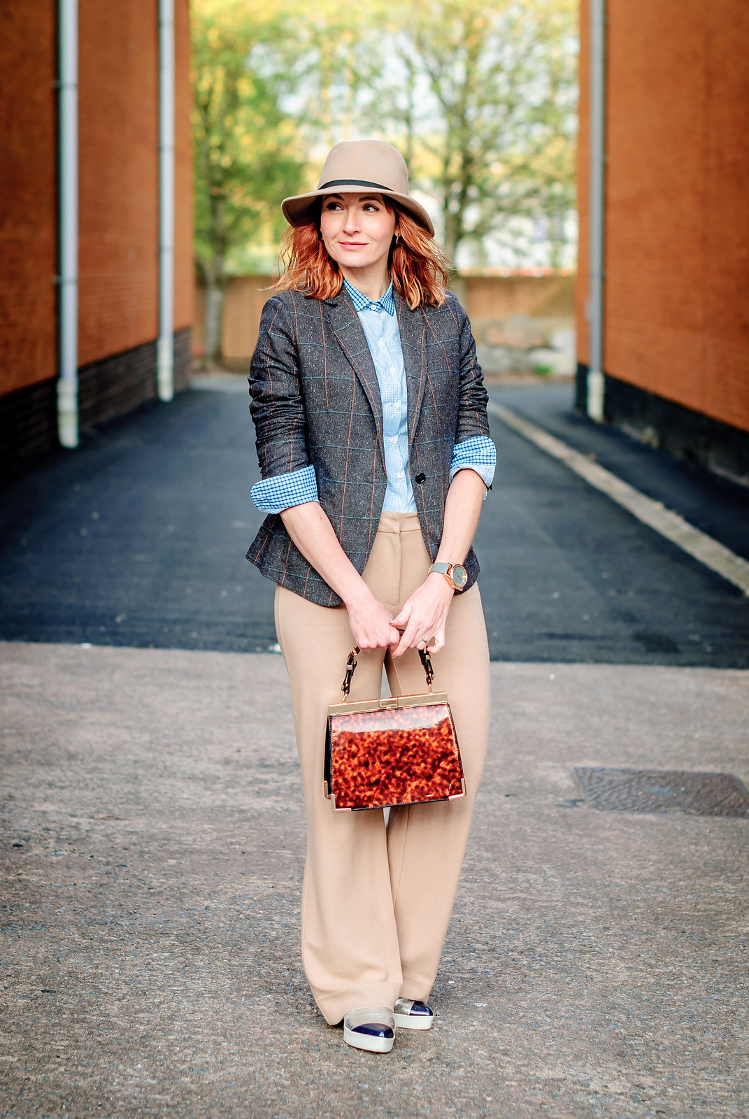 Smart British tailoring by Arthur Shirtley: Check shirt tweed silk blazer camel wide leg trousers silver slip on sneakers tortoiseshell bag camel fedora | Not Dressed As Lamb, over 40 style
