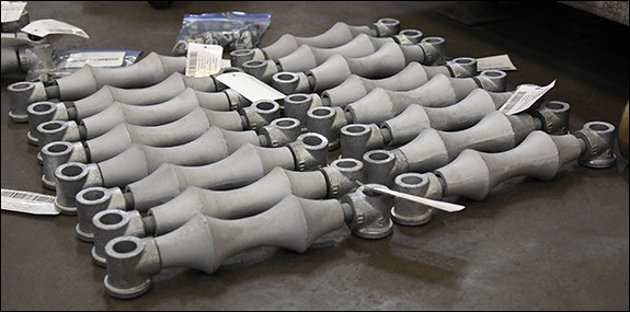 Trapeze Roller Hangers for a Food Processing Facility