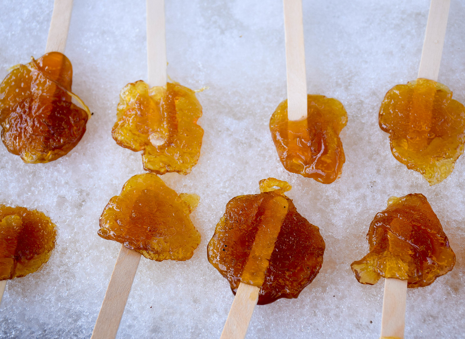 Maple taffy on snow - March is the best time to go to a Sugar Shack in Canada